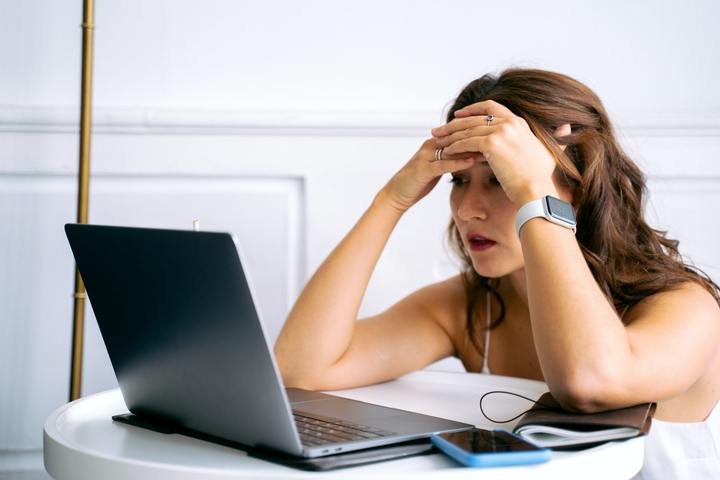 Women working on a laptop.